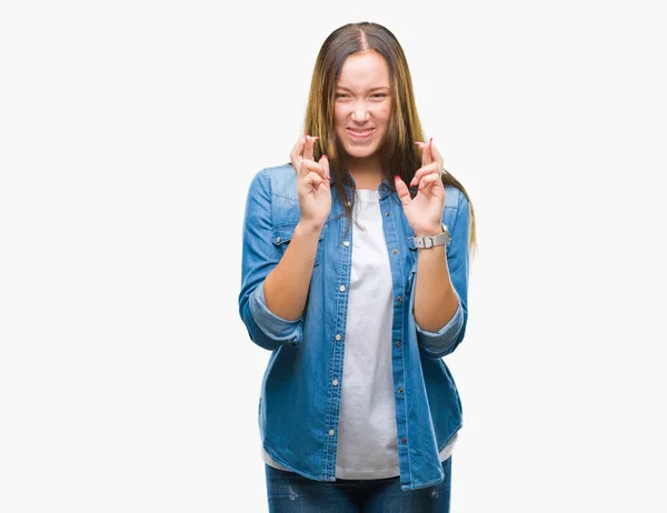 Joven Caucásica Hermosa Mujer Sobre Aislado Fondo Sonriendo Cruzando Dedos — Foto de Stock