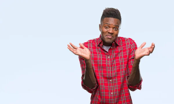 Jovem Homem Afro Americano Sobre Fundo Isolado Expressão Indolor Confuso — Fotografia de Stock