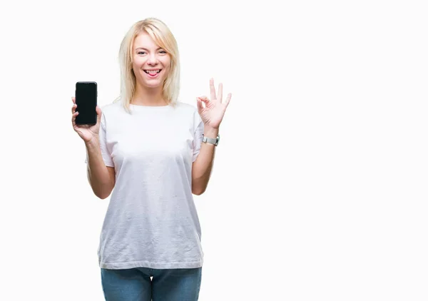 Молодая Красивая Блондинка Показывает Экран Смартфона Изолированном Фоне Делает Знак — стоковое фото