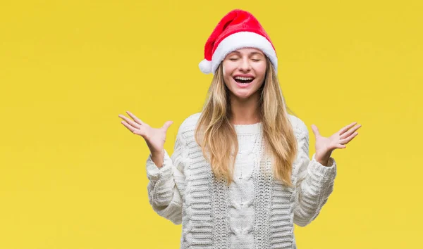 Jovem Mulher Loira Bonita Vestindo Chapéu Natal Sobre Fundo Isolado — Fotografia de Stock