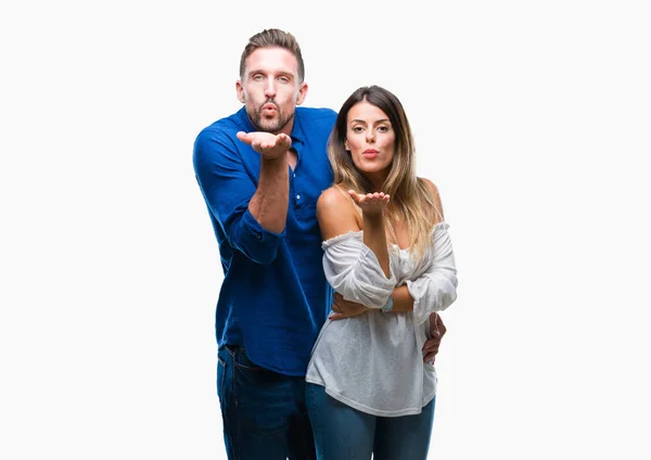 Young Couple Love Isolated Background Looking Camera Blowing Kiss Hand — Stock Photo, Image