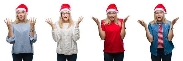 年轻美丽的金发碧眼的女人穿着圣诞帽在白色孤立的背景庆祝疯狂和惊讶的成功与手臂抬起和睁大眼睛尖叫兴奋 优胜者概念 — 图库照片