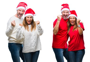 Kolaj bir orta yaş olgun güzel çift beyaz izole arka plan çok mutlu ve heyecanlı kaldırdı, gülümseyen ve başarı için çığlık silah ile kazanan jest yapıyor üzerinde Noel şapka giyiyor. Kutlama kavramı.