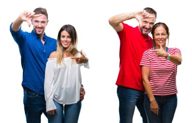 Genç ve Olgun çift elle yapma çerçeve ve parmakları ile mutlu yüz gülümseyen izole arka plan üzerinde aşık kolaj. Yaratıcılık ve Fotoğrafçılık kavramı.