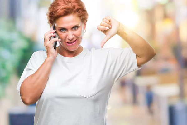 Atrractive Senior Caucasian Redhead Woman Talking Smartphone Isolated Background Angry — Stock Photo, Image