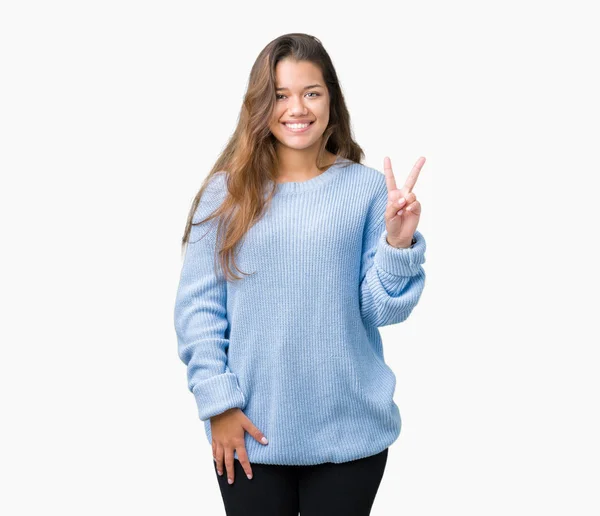 Junge Schöne Brünette Frau Trägt Blauen Winterpullover Über Isoliertem Hintergrund — Stockfoto