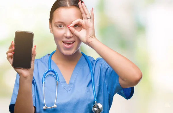 Young Caucasian Doctor Woman Showing Smarpthone Isolated Background Happy Face — Stock Photo, Image