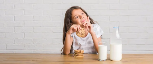 Young Hispanic Kid Sitting Table Drinking Milk Eating Chocolate Cooky — Stock Photo, Image