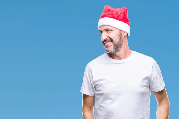 Hombre Mediana Edad Con Sombrero Navidad Sobre Fondo Aislado Mirando — Foto de Stock