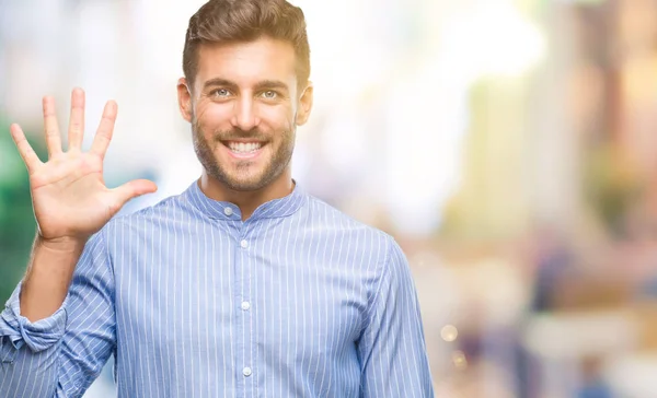 Joven Hombre Guapo Sobre Fondo Aislado Mostrando Señalando Hacia Arriba —  Fotos de Stock