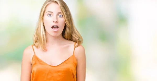 Beautiful Young Woman Wearing Orange Shirt Isolated Background Afraid Shocked — Stock Photo, Image