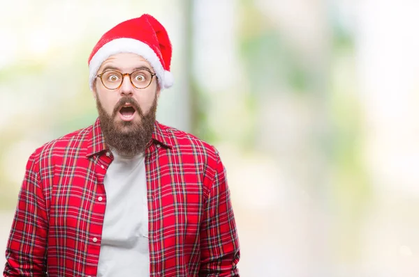 Junger Kaukasischer Mann Mit Weihnachtsmütze Über Isoliertem Hintergrund Ängstlich Und — Stockfoto