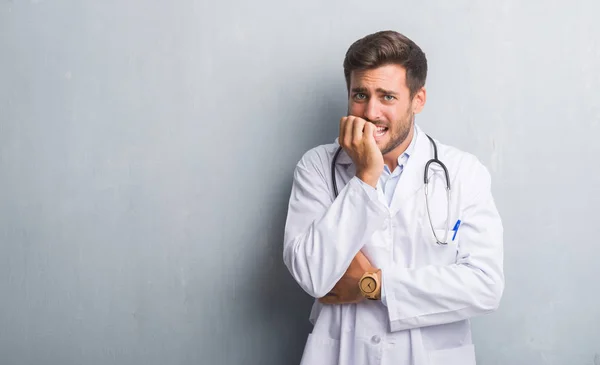 Handsome Young Doctor Man Grey Grunge Wall Looking Stressed Nervous — Stock Photo, Image