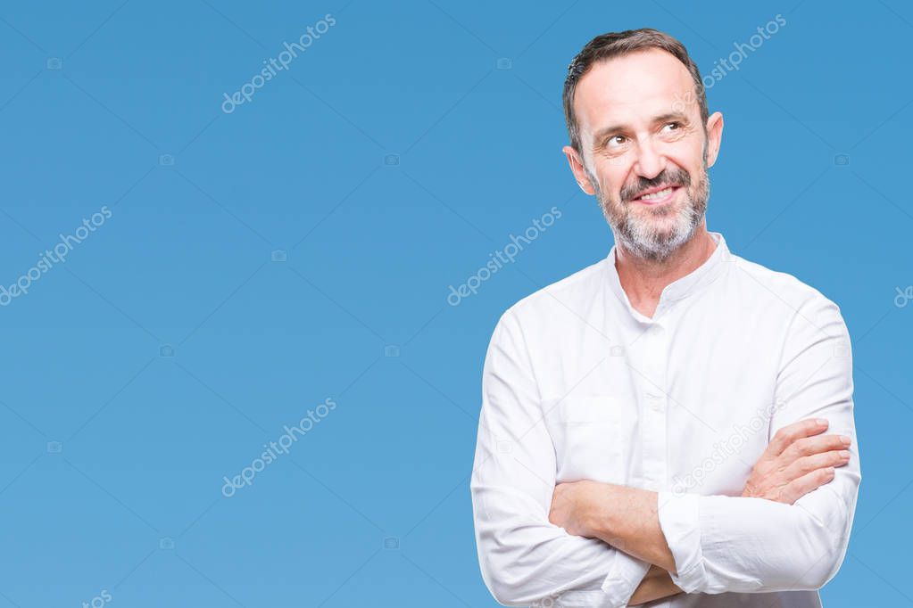 Middle age hoary senior man over isolated background smiling looking side and staring away thinking.