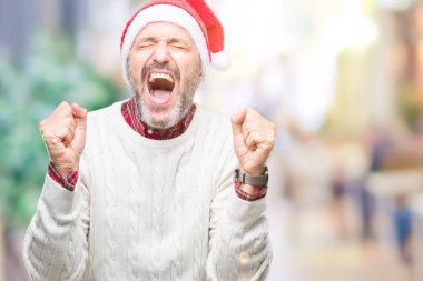 Arka plan deli kutlama Noel şapka üzerinde orta yaş ağarmış komuta sizde izole ve crazy arms ile başarı için kaldırdı ve heyecanlı çığlık gözler kapalı. Kazanan kavramı