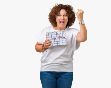 Adet takvim üzerinde izole arka rahatsız ve öfke, çılgın ve yükseltilmiş el, öfke kavramı ile diye bağıran ile sinirli bağırarak tutan orta ager üst düzey kadın