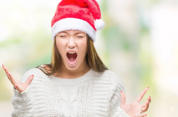 Junge Schöne Kaukasische Frau Mit Weihnachtsmütze Über Isoliertem Hintergrund Verrückt — Stockfoto