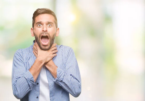 Joven Hombre Guapo Vistiendo Una Camiseta Blanca Sobre Fondo Aislado — Foto de Stock