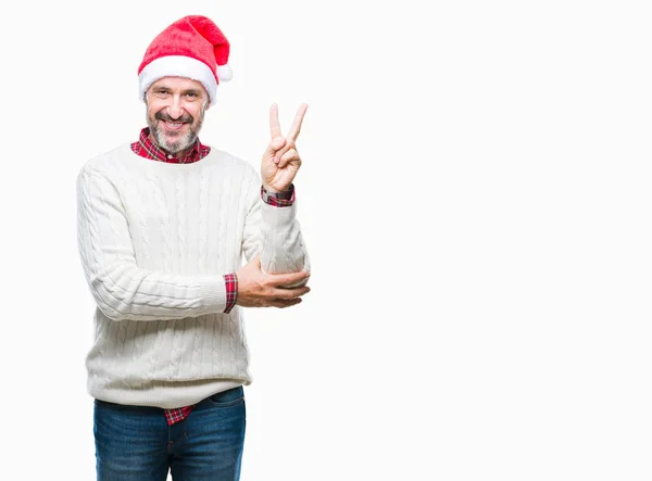 Hombre Mediana Edad Con Sombrero Navidad Sobre Fondo Aislado Sonriendo — Foto de Stock