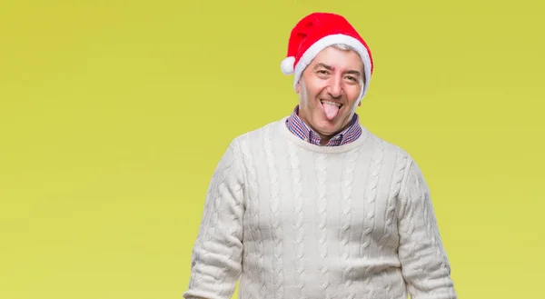 Pěkný Starší Muž Nosí Vánoční Čepice Izolované Pozadí Držet Jazyk — Stock fotografie