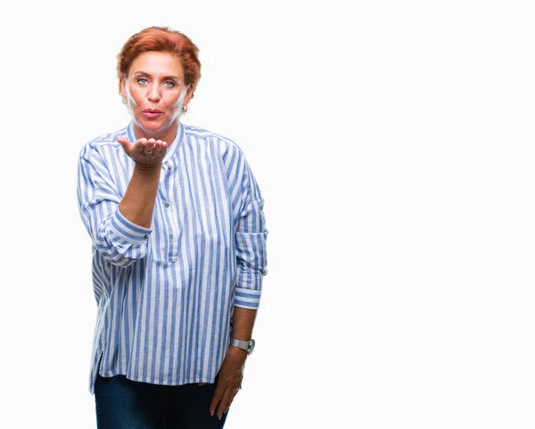 Atrractive Senior Caucasian Redhead Woman Isolated Background Looking Camera Blowing — Stock Photo, Image