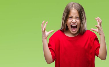 Genç güzel kız izole arka plan çılgın ve kızgın bağırarak ve agresif ifade ve silah kaldırdı bağırıyor. Hayal kırıklığı kavramı.