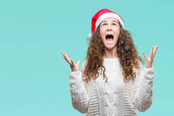 Chica Morena Joven Con Sombrero Navidad Sobre Fondo Aislado Celebrando — Foto de Stock