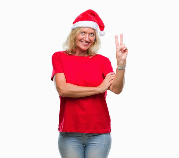 Středním Věku Blond Žena Nosí Vánoční Čepice Izolované Pozadí Usmívající — Stock fotografie