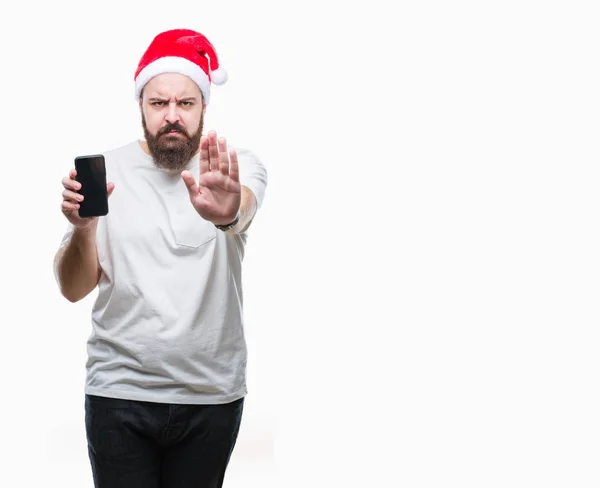 Junger Kaukasischer Mann Mit Weihnachtsmütze Smartphone Bildschirm Vor Isoliertem Hintergrund — Stockfoto