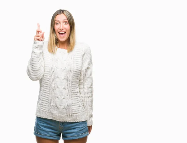 Mujer Hermosa Joven Con Suéter Invierno Sobre Fondo Aislado Señalando —  Fotos de Stock