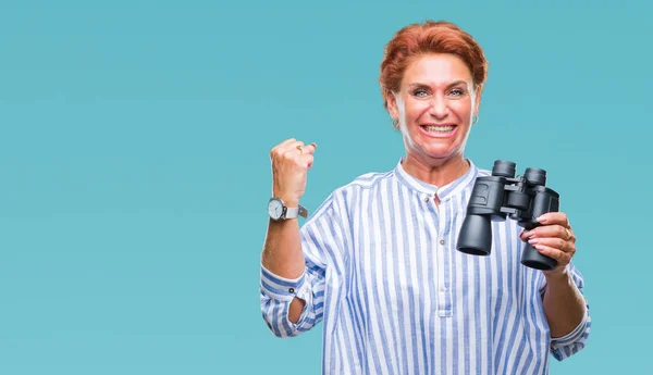 Senior Caucasian Woman Looking Binoculars Isolated Background Screaming Proud Celebrating — Stock Photo, Image