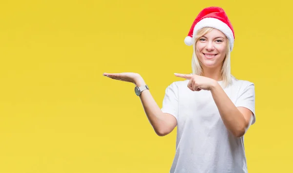 Jonge Mooie Blonde Vrouw Met Kerst Hoed Geïsoleerde Achtergrond Verbaasd — Stockfoto