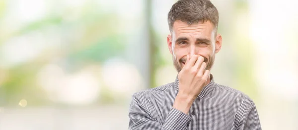 Young Hipster Man Smelling Something Stinky Disgusting Intolerable Smell Holding — Stock Photo, Image