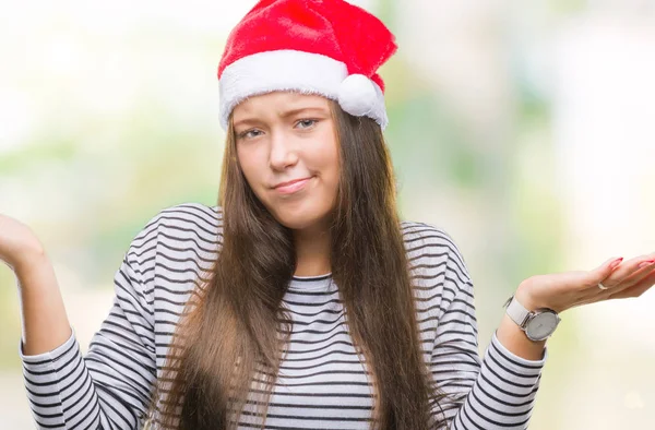 Mooie Kaukasische Jongedame Kerstmuts Dragen Geïsoleerde Achtergrond Clueless Verward Expressie — Stockfoto