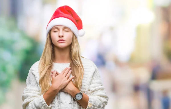 Jovem Mulher Loira Bonita Vestindo Chapéu Natal Sobre Fundo Isolado — Fotografia de Stock