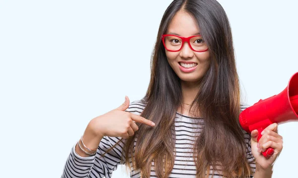 Young Asian Woman Holding Megaphone Isolated Background Surprise Face Pointing — Stock Photo, Image