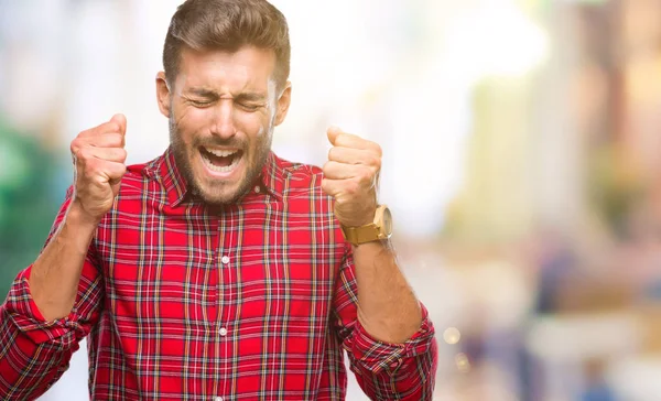 Joven Hombre Guapo Sobre Fondo Aislado Emocionado Por Éxito Con —  Fotos de Stock