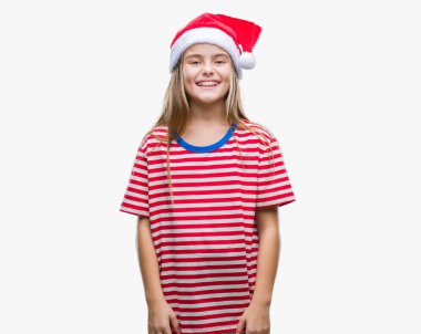 Üzerinde Noel şapka giyen genç güzel kız arka yüzünde mutlu ve güzel bir gülümseme ile izole. Şanslı kişi.