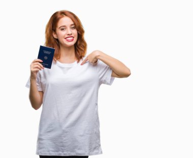 Pasaport Almanya'nın sürpriz yüz işaret parmağı kendini izole arka plan üzerinde tutan genç güzel kadın
