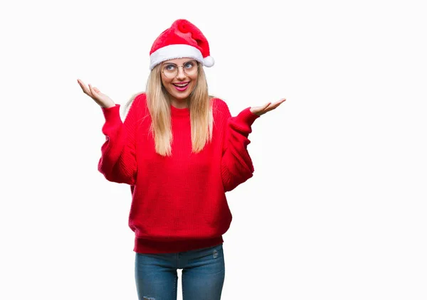Молодая Красивая Блондинка Рождественской Шляпе Изолированном Фоне Невежественное Запутанное Выражение — стоковое фото
