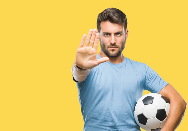 Jovem Homem Bonito Segurando Bola Futebol Sobre Fundo Isolado Com — Fotografia de Stock