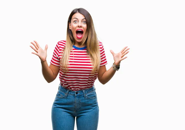 Mujer Hermosa Joven Mirada Casual Sobre Fondo Aislado Celebrando Loco —  Fotos de Stock