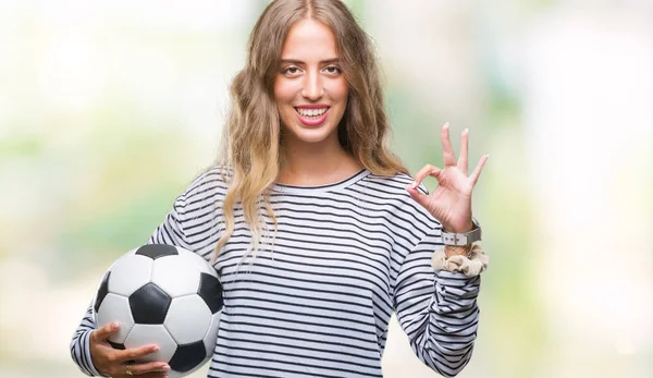 Beautiful Young Blonde Woman Holding Soccer Football Ball Isolated Background — Stock Photo, Image