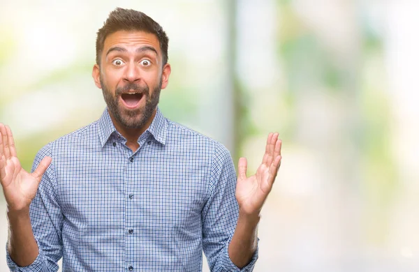 Hombre Hispano Adulto Sobre Fondo Aislado Celebrando Loco Sorprendido Por —  Fotos de Stock