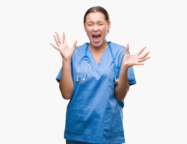 Joven Doctora Caucásica Vistiendo Uniforme Médico Sobre Fondo Aislado Celebrando — Foto de Stock