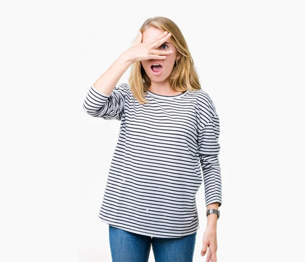 Beautiful Young Woman Wearing Stripes Sweater Isolated Background Peeking Shock — Stock Photo, Image