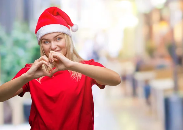 Junge Kaukasische Frau Mit Weihnachtsmütze Vor Isoliertem Hintergrund Die Verliebt — Stockfoto