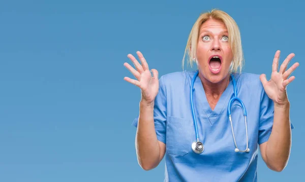 Middle Age Blonde Nurse Surgeon Doctor Woman Isolated Background Crazy — Stock Photo, Image