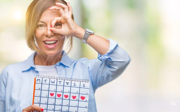 Donna Ispanica Anziana Mezza Età Che Tiene Calendario Mestruale Sfondo — Foto Stock