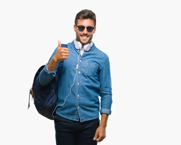 Young Handsome Tourist Man Wearing Headphones Backpack Isolated Background Doing — Stock Photo, Image